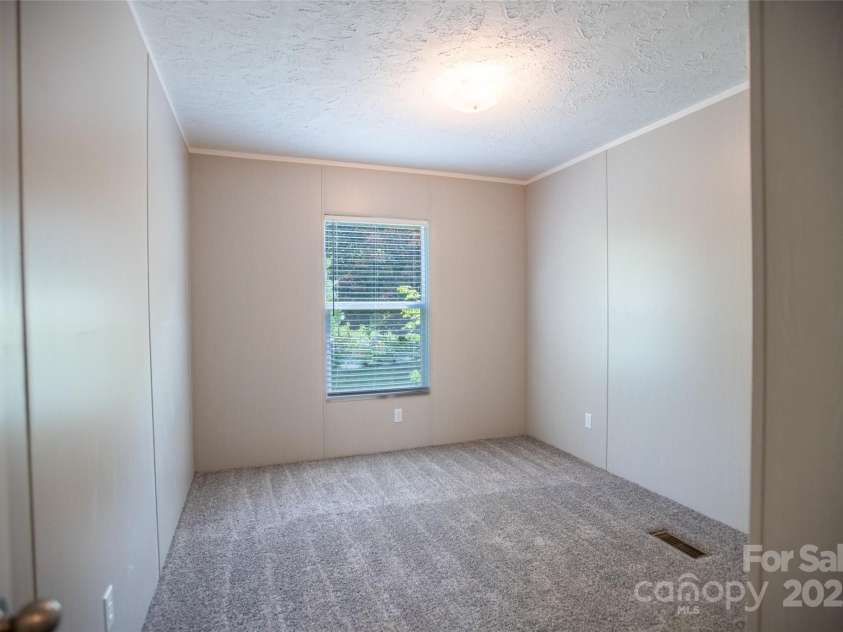 1451 Newfound Road, Leicester, NC 28748.  MLS# CAR4288649, YatesRealty ID 30020. 