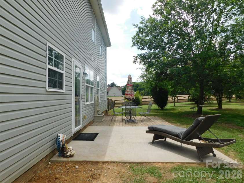 5402 Griffith Road, Monroe, NC 28112.  MLS# CAR4387389, YatesRealty ID 30020. Concrete patio