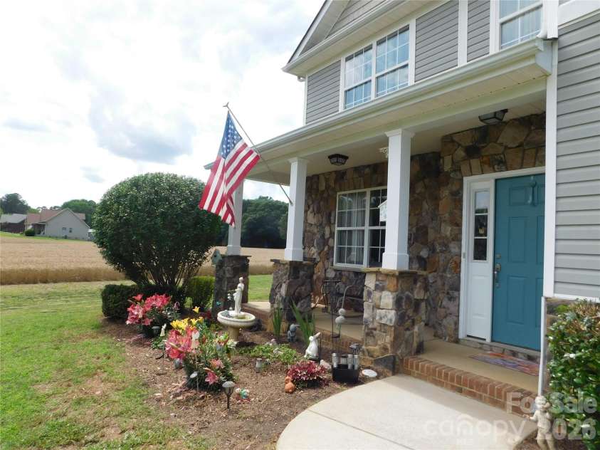 5402 Griffith Road, Monroe, NC 28112.  MLS# CAR4387389, YatesRealty ID 30020. Covered front porch