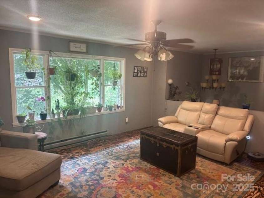 660 Big Windfall Road, Lansing, NC 28643.  MLS# CAR4288623, YatesRealty ID 30024. 