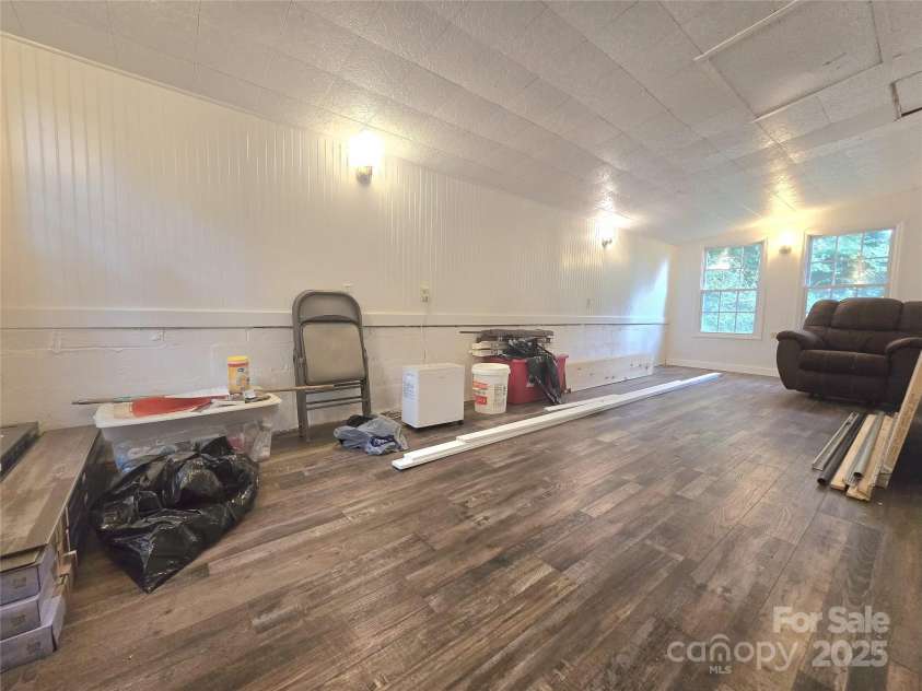 11 Edwards Street, Asheville, NC 28806.  MLS# CAR4287860, YatesRealty ID 30027. Covered back porch area