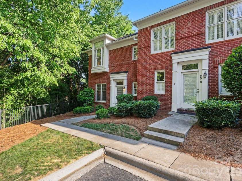 2515 Dilworth Heights Lane, Charlotte, NC 28209.  MLS# CAR4388904, YatesRealty ID 30027. End unit next to luscious greenery