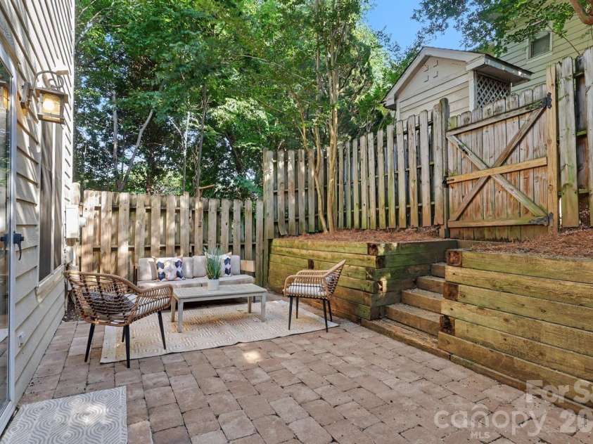 2515 Dilworth Heights Lane, Charlotte, NC 28209.  MLS# CAR4388904, YatesRealty ID 30027. Private back porch