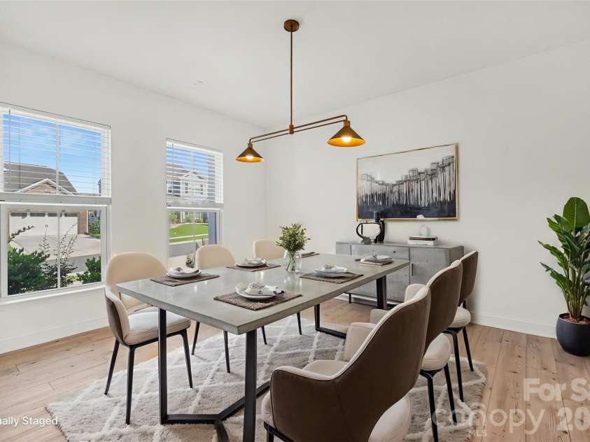 14125 Glaswick Drive, Charlotte, NC 28278.  MLS# CAR4400797, YatesRealty ID 30033. Virtually Staged Formal Dining Room with Updated Lighting and LVP Flooring.