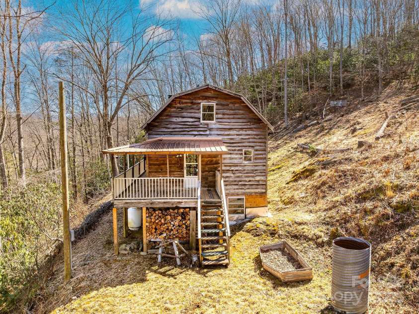 177 Bradford Road, Burnsville, NC 28714.  MLS# CAR4233319, YatesRealty ID 30036. Ample garden space out back