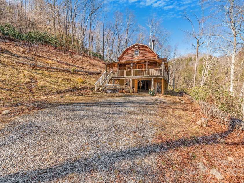 177 Bradford Road, Burnsville, NC 28714.  MLS# CAR4233319, YatesRealty ID 30036. Cleared hillside ready for spring fed terraced gardens
