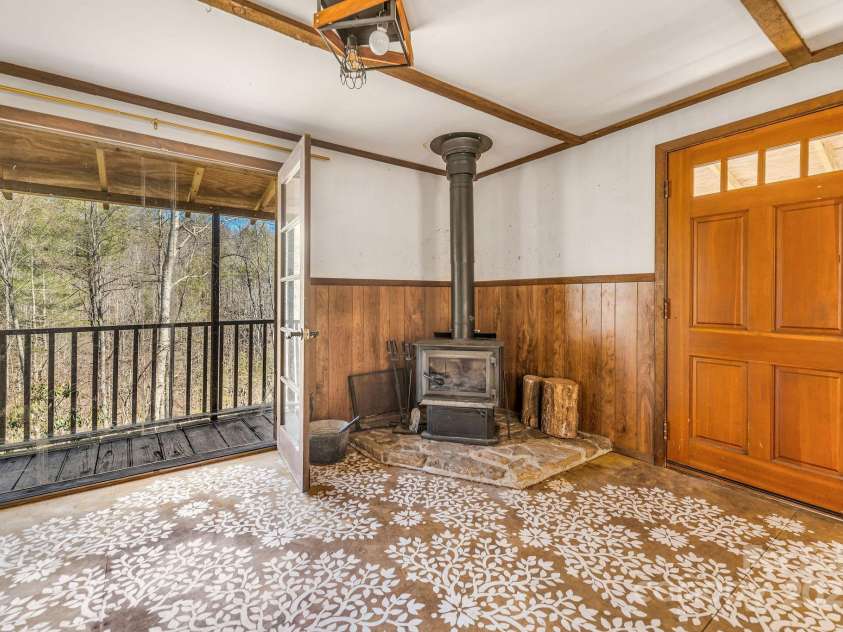 177 Bradford Road, Burnsville, NC 28714.  MLS# CAR4233319, YatesRealty ID 30036. How much wood would a wood stove burn if a wood stove could stove wood?