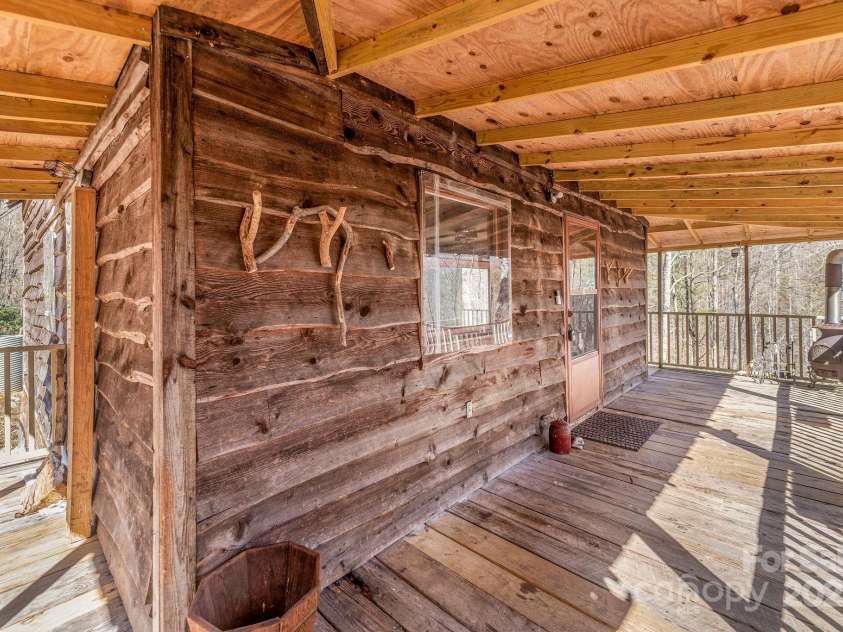177 Bradford Road, Burnsville, NC 28714.  MLS# CAR4233319, YatesRealty ID 30036. Wrap around porch