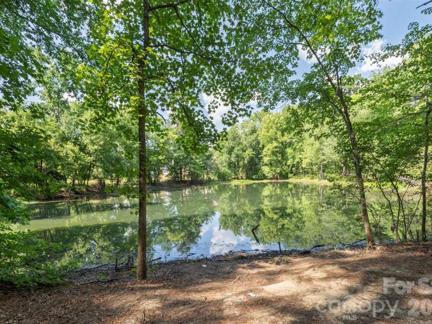 540 Rough Hewn Lane, Rock Hill, SC 29730.  MLS# CAR4383609, YatesRealty ID 30041. Walking trail