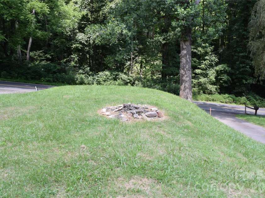 619 Kitchens Branch Road, Sylva, NC 28779.  MLS# CAR4386073, YatesRealty ID 30047. Firepit