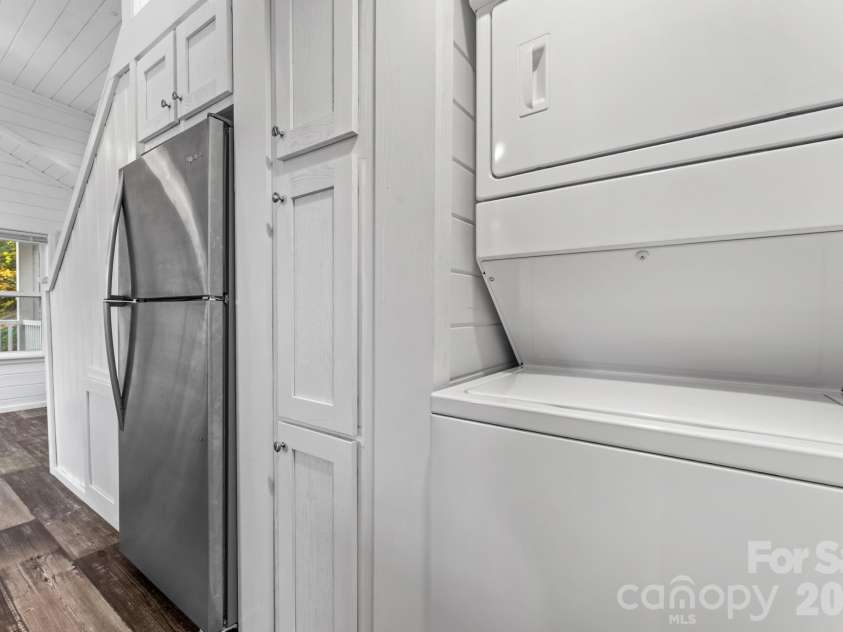 619 Kitchens Branch Road, Sylva, NC 28779.  MLS# CAR4386073, YatesRealty ID 30047. Laundry and refrigerator
