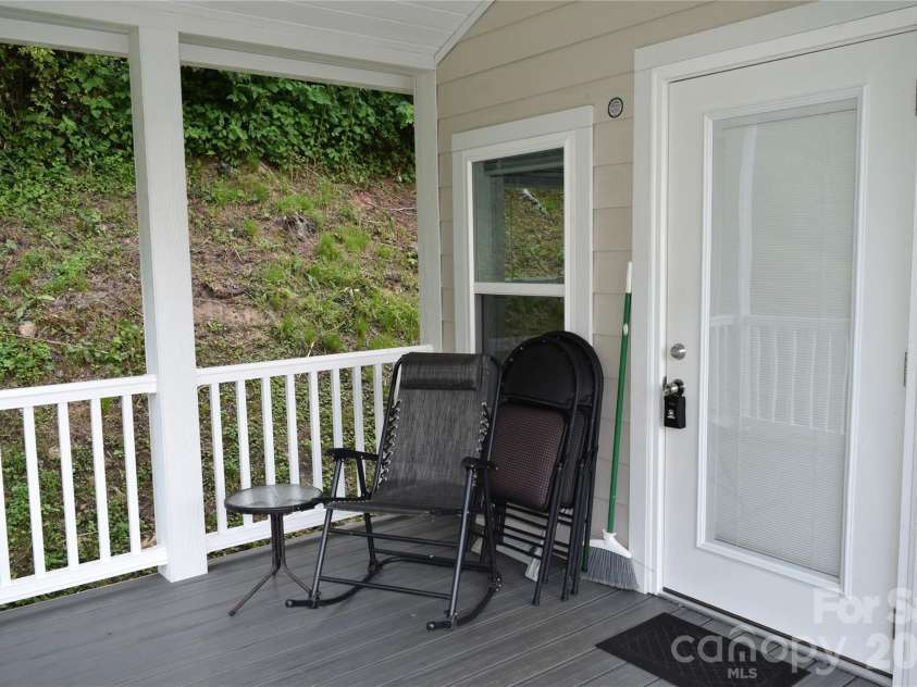 619 Kitchens Branch Road, Sylva, NC 28779.  MLS# CAR4386073, YatesRealty ID 30047. Porch