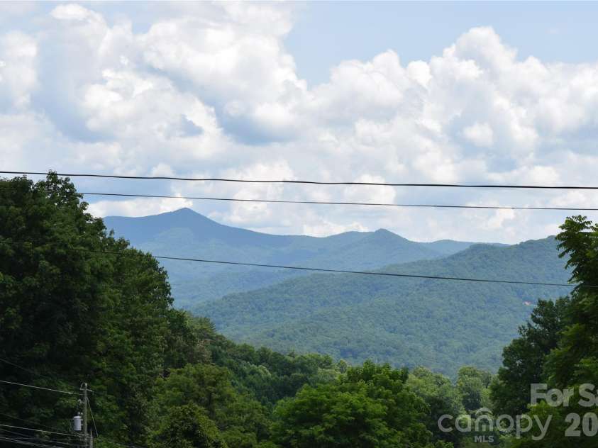619 Kitchens Branch Road, Sylva, NC 28779.  MLS# CAR4386073, YatesRealty ID 30047. View from porch and inside windows