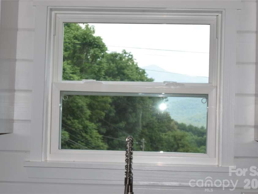 619 Kitchens Branch Road, Sylva, NC 28779.  MLS# CAR4386073, YatesRealty ID 30047. View from window over kitchen sink