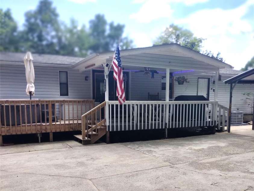 101 Branch Breeze Lane, Zirconia, NC 28790.  MLS# CAR4280236, YatesRealty ID 30051. Back of home
