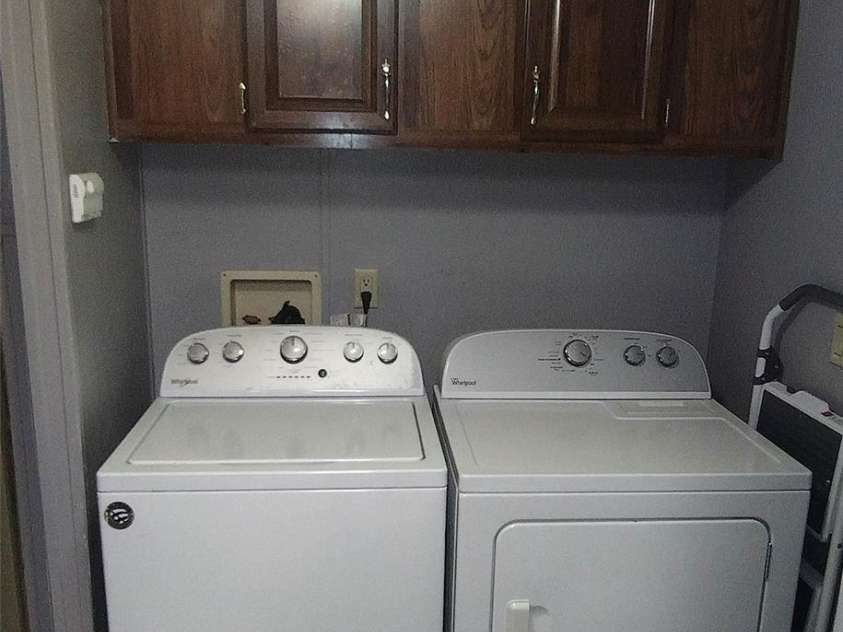 101 Branch Breeze Lane, Zirconia, NC 28790.  MLS# CAR4280236, YatesRealty ID 30051. Laundry From Kitchen