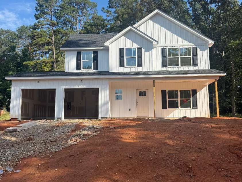 124 Devine Street, Stanley, NC 28164.  MLS# CAR4288469, YatesRealty ID 30064. Actual photo of home under construction