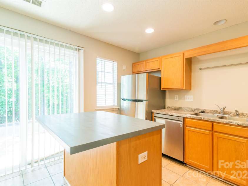 10763 Holly Ridge Boulevard, Charlotte, NC 28216.  MLS# CAR4274578, YatesRealty ID 30065. 