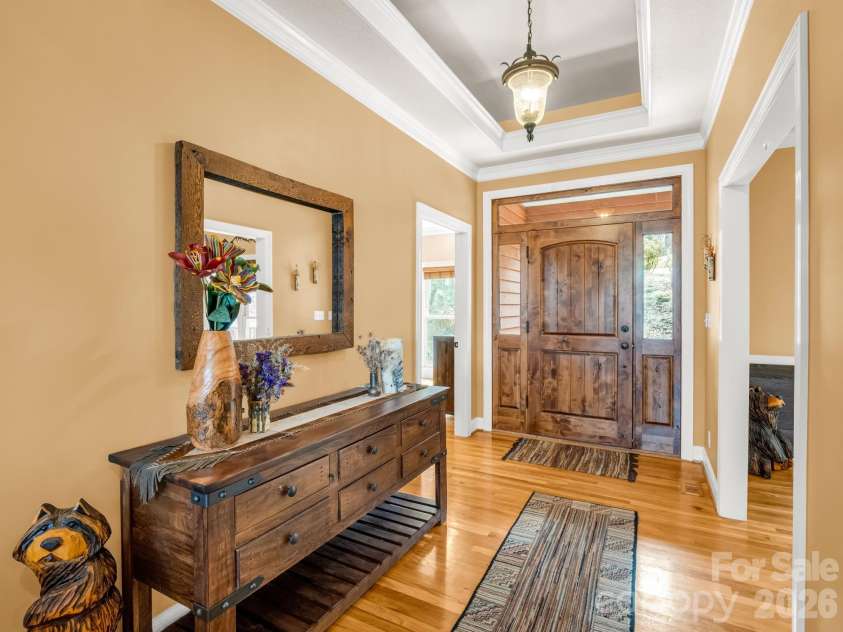 140 Mount Hebron Road, Hendersonville, NC 28739.  MLS# CAR4350162, YatesRealty ID 30065. Foyer with warm, solid oak floors