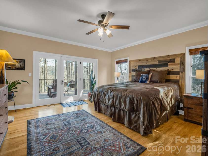 140 Mount Hebron Road, Hendersonville, NC 28739.  MLS# CAR4350162, YatesRealty ID 30065. Primary Bedroom with Private Deck Access
