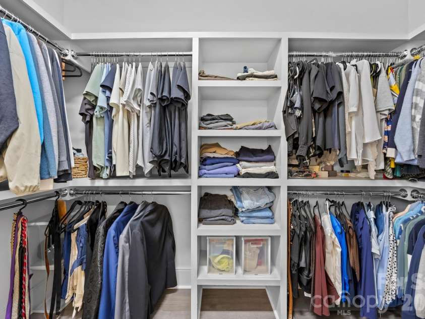 3124 Creighton Drive, Charlotte, NC 28205.  MLS# CAR4350182, YatesRealty ID 30067. Large primariy walk in closet with custom solid built in shelving