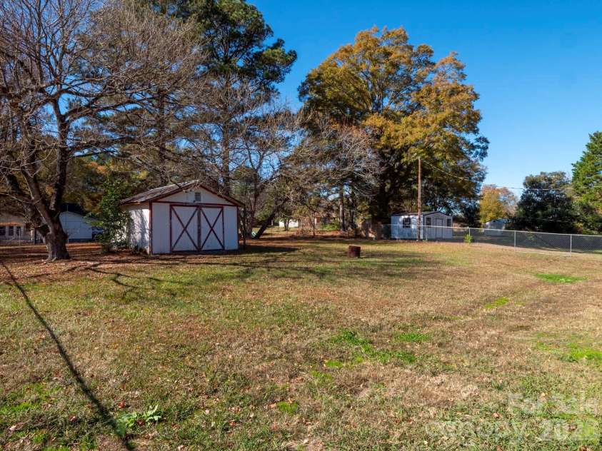 2826 Drew Drive, Lancaster, SC 29720.  MLS# CAR4320135, YatesRealty ID 3007. Backyard with shed