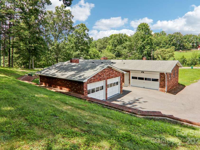 324 Old Leicester Highway, Asheville, NC 28806.  MLS# CAR4223880, YatesRealty ID 30073. Back View + Garaages