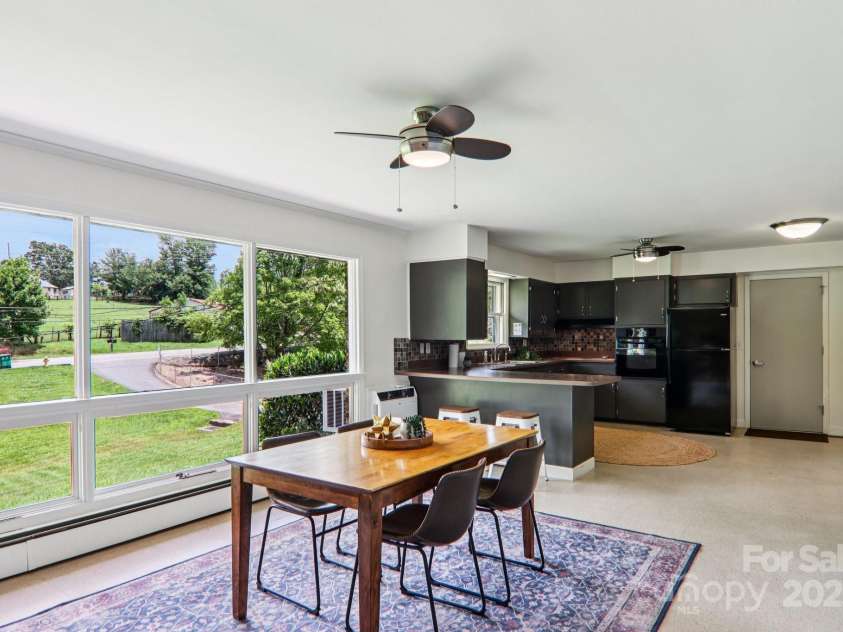 324 Old Leicester Highway, Asheville, NC 28806.  MLS# CAR4223880, YatesRealty ID 30073. Massive Windows In Dining Kitchen