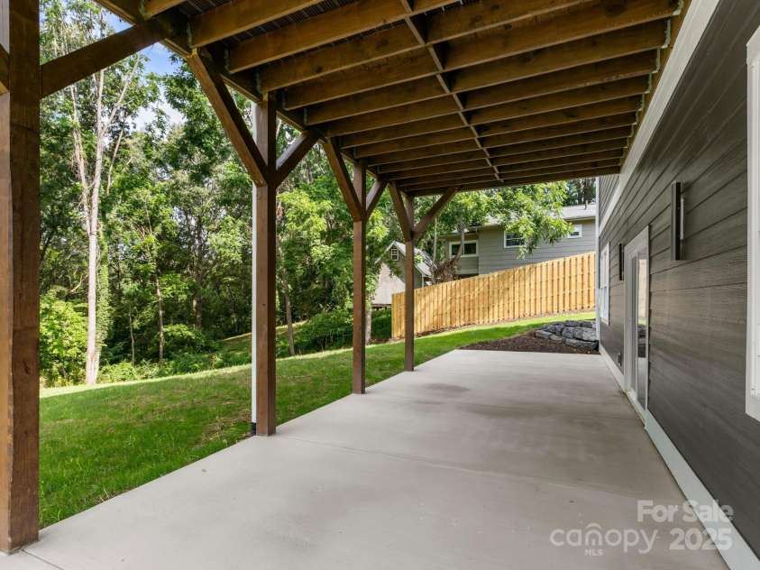 231 Asbury Road, Candler, NC 28715.  MLS# CAR4283786, YatesRealty ID 30077. Back Patio