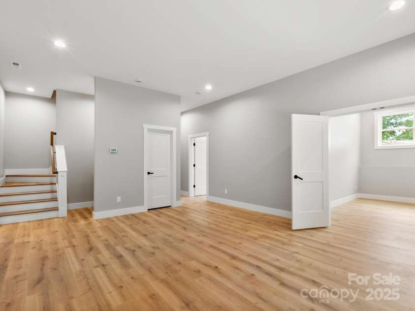 231 Asbury Road, Candler, NC 28715.  MLS# CAR4283786, YatesRealty ID 30077. Family Room