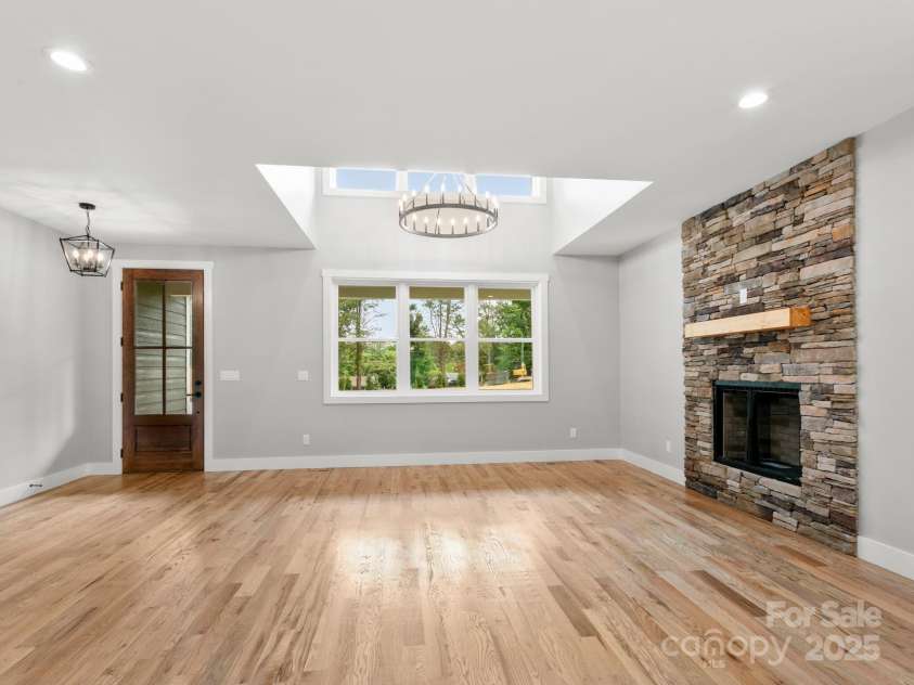 231 Asbury Road, Candler, NC 28715.  MLS# CAR4283786, YatesRealty ID 30077. Living room