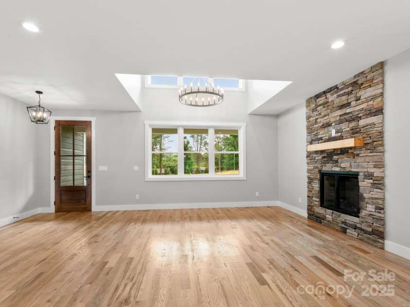 231 Asbury Road, Candler, NC 28715.  MLS# CAR4283786, YatesRealty ID 30077. Living room