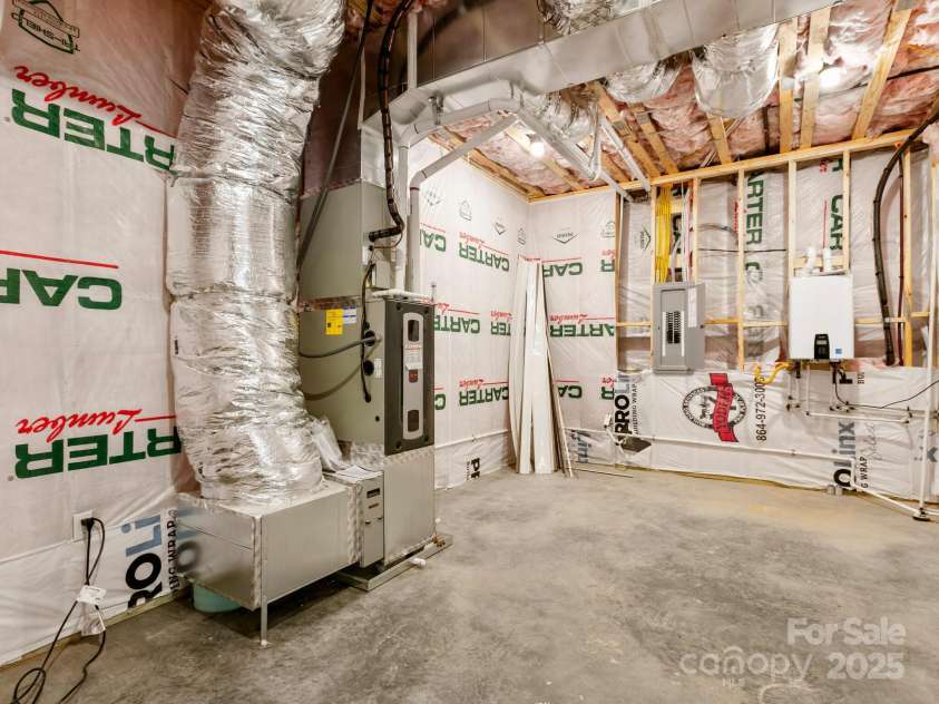 231 Asbury Road, Candler, NC 28715.  MLS# CAR4283786, YatesRealty ID 30077. Mechanical and Storage