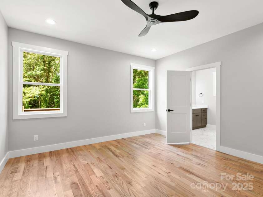 231 Asbury Road, Candler, NC 28715.  MLS# CAR4283786, YatesRealty ID 30077. Primary Bedroom