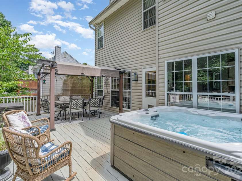 108 Shade Tree Circle, Fort Mill, SC 29715.  MLS# CAR4268600, YatesRealty ID 30080. Hot tub is waiting for you