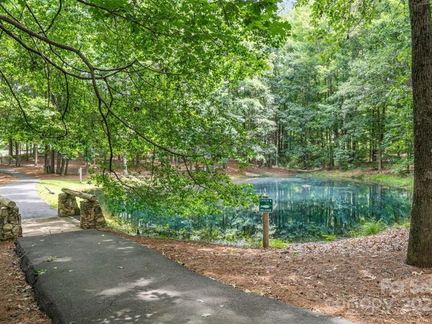 108 Shade Tree Circle, Fort Mill, SC 29715.  MLS# CAR4268600, YatesRealty ID 30080. Walking Trails and small pond