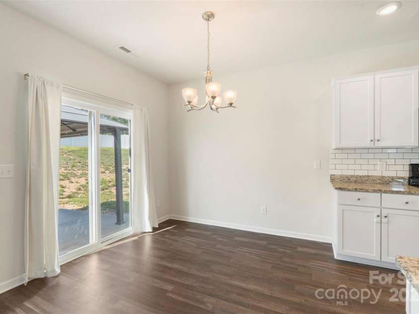 304 Ware Street, Kings Mountain, NC 28086.  MLS# CAR4282123, YatesRealty ID 30083. Dining area looking onto the massive backyard!
