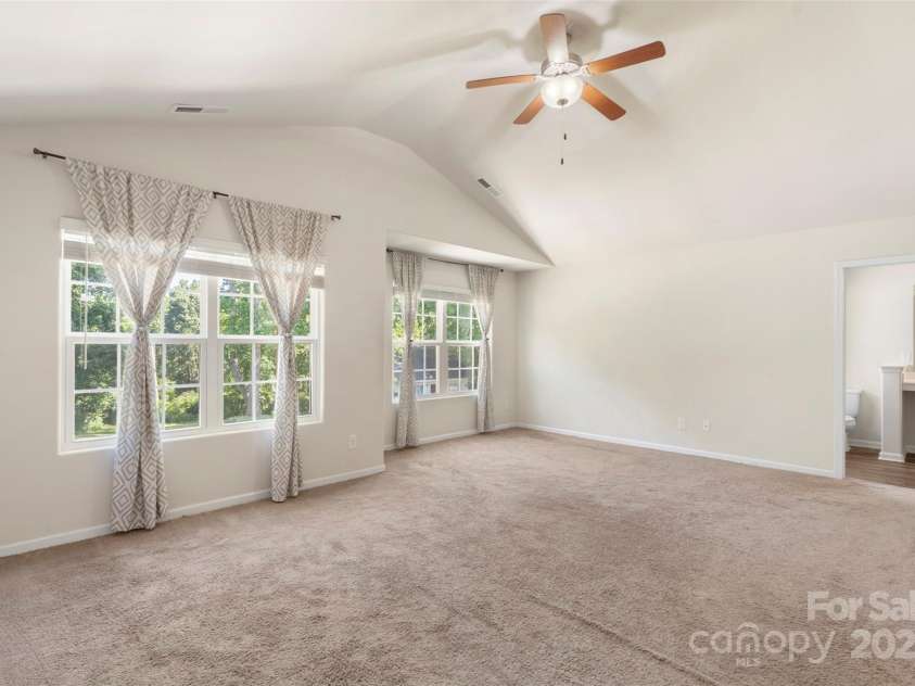 304 Ware Street, Kings Mountain, NC 28086.  MLS# CAR4282123, YatesRealty ID 30083. Massive primary suite with vaulted ceiling.