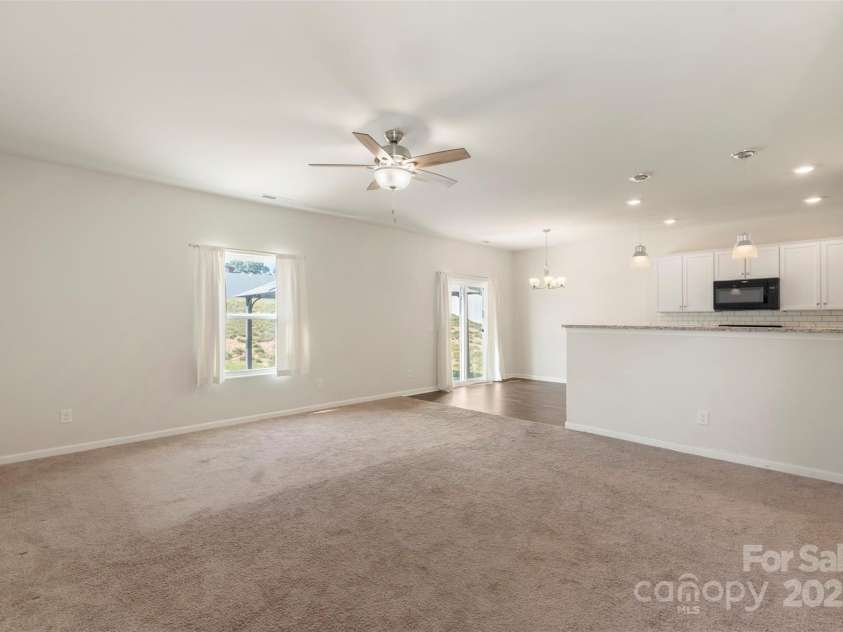 304 Ware Street, Kings Mountain, NC 28086.  MLS# CAR4282123, YatesRealty ID 30083. Open living space but still a little privacy from the kitchen peninsula so you can store all your needed kitchen supplies!