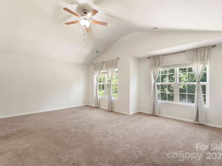 304 Ware Street, Kings Mountain, NC 28086.  MLS# CAR4282123, YatesRealty ID 30083. The wall of windows in this room create such a bright, airy atmosphere