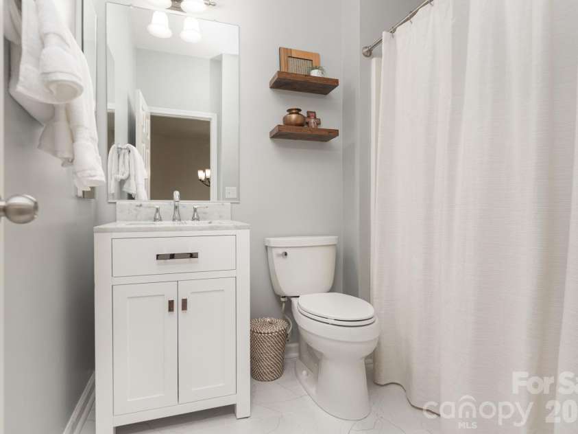 438 Magnolia Street, Davidson, NC 28036.  MLS# CAR4368147, YatesRealty ID 30083. Updated hall bath