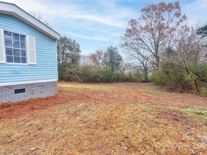 2124 Mcbrayer Springs Road, Shelby, NC 28150.  MLS# CAR4206990, YatesRealty ID 3009. Side