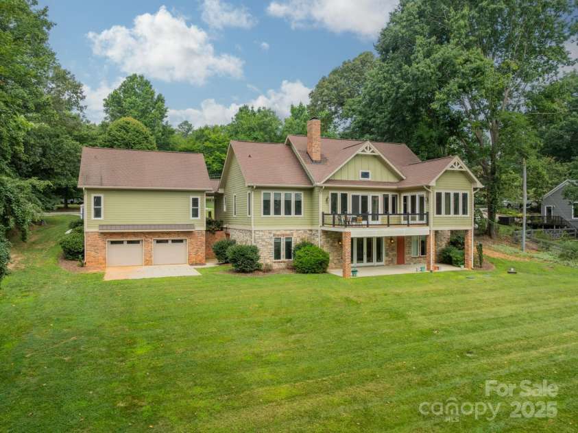 221 Stillwater Road, Troutman, NC 28166.  MLS# CAR4255773, YatesRealty ID 30097. YES - LARGE 2-car garage from the BACK, TOO ... lawn equipment, extra boat/skis, collector cars - whatever YOU need to have here!