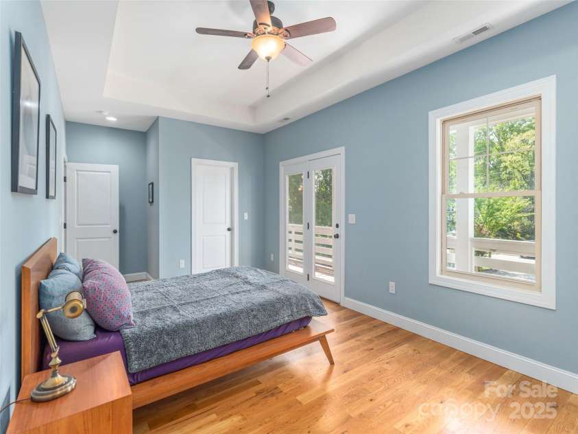 219 Courtland Place, Asheville, NC 28801.  MLS# CAR4252629, YatesRealty ID 30098. Primary Bedroom w Private Front Covered Balcony