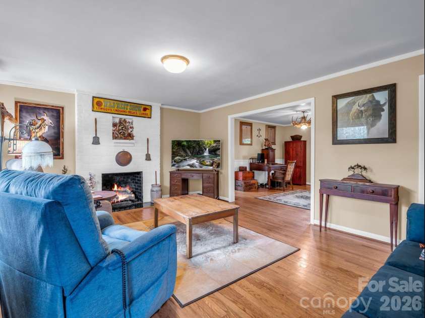 10 Deer Run Lane, Columbus, NC 28722.  MLS# CAR4392486, YatesRealty ID 30101. Living room opens to the dining room
