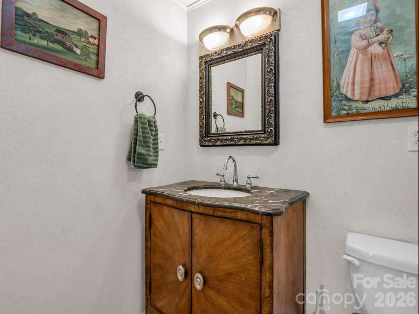 10 Deer Run Lane, Columbus, NC 28722.  MLS# CAR4392486, YatesRealty ID 30101. Primary bathroom vanity