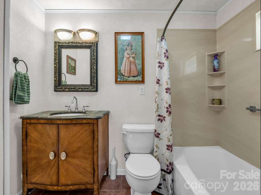 10 Deer Run Lane, Columbus, NC 28722.  MLS# CAR4392486, YatesRealty ID 30101. Primary bedroom ensuite bathroom