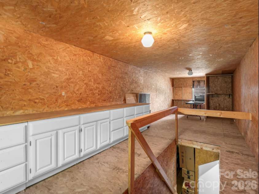 10 Deer Run Lane, Columbus, NC 28722.  MLS# CAR4392486, YatesRealty ID 30101. Storage area over the detached garage