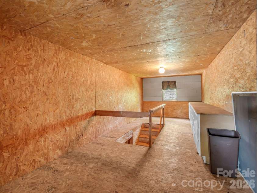 10 Deer Run Lane, Columbus, NC 28722.  MLS# CAR4392486, YatesRealty ID 30101. Storage area over the detached garage