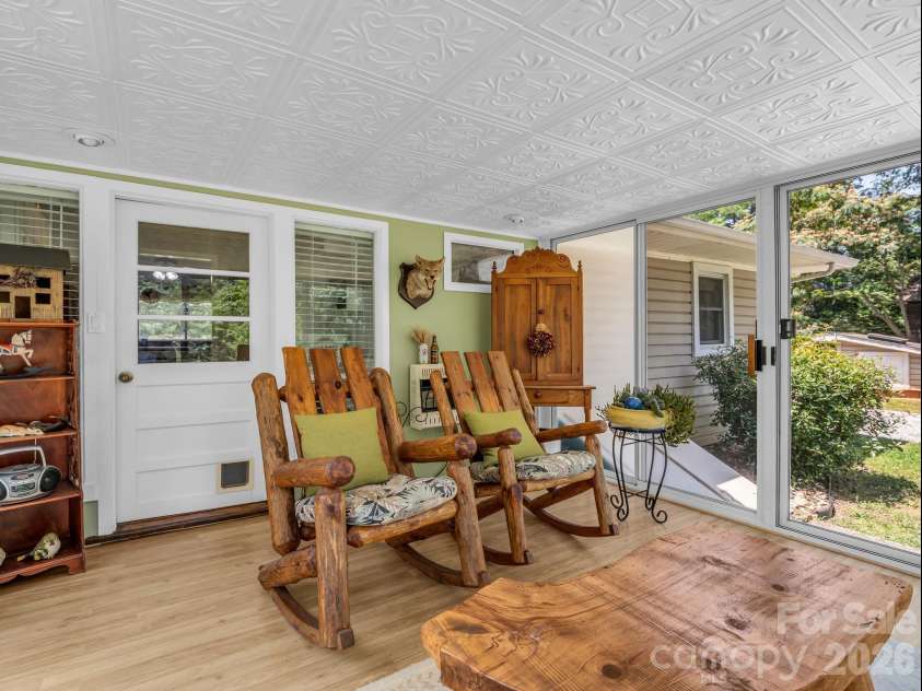 10 Deer Run Lane, Columbus, NC 28722.  MLS# CAR4392486, YatesRealty ID 30101. Sunroom is perfect for relaxing